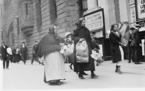 Carrying home Xmas baskets, between c1910 and c1915. Creator: Bain News Service.