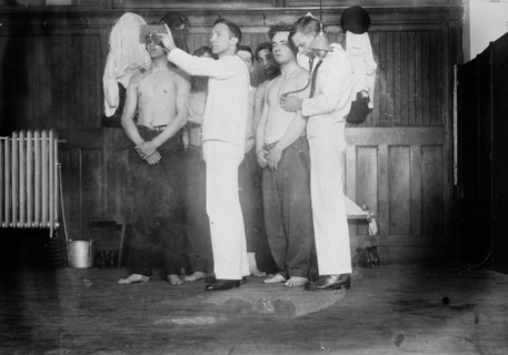 Examining new Navy Recruits, between c1910 and c1915. Creator: Bain News Service.