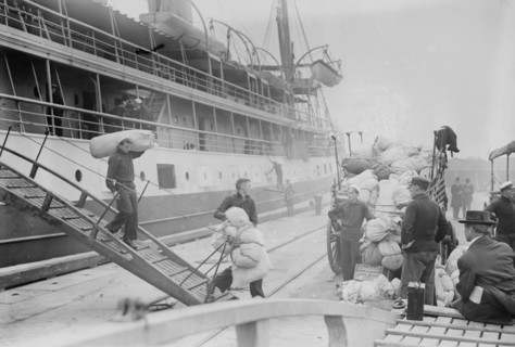 Taking Luggage off "Solace", 1914. Creator: Bain News Service.