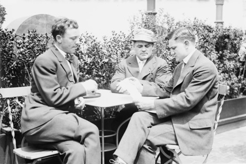 Willie Ritchie reading cable of acceptance to Steffen & Thiry, between c1910 and c1915. Creator: Bain News Service.