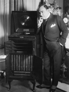 Enrico Caruso with phonograph, between 1918 and c1920. Creator: Bain News Service.