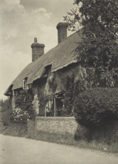 Thatched cottage. From the album: Photograph album - England, 1920s. Creator: Harry Moult.