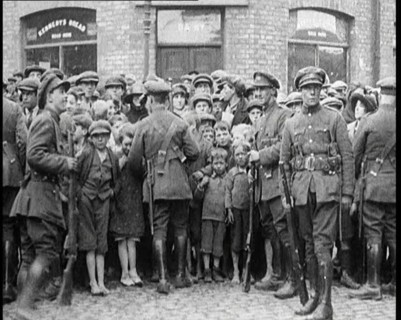 Soldiers Holding Back Children in Dublin, 1922. Creator: British Pathe Ltd.