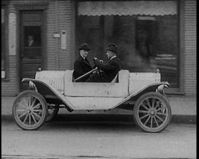 Male Civilians Test Driving the Two Way Car Which Has Two Steering Wheels and Can Be Driven..., 1929 Creator: British Pathe Ltd.