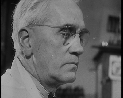 Dr Alexander Fleming, the Inventor of Penicillin, Experimenting in a Laboratory, 1929. Creator: British Pathe Ltd.
