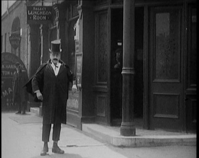 Scenes of Comedian Billy Bennett Being Thrown Out of a Public House, 1929. Creator: British Pathe Ltd.