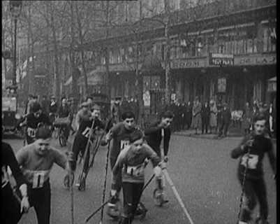 Racers Skiing Through Paris, France on Wheeled Skis, 1929. Creator: British Pathe Ltd.