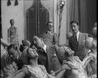 Scene from a Stage Show: Male and Female Civilians Dancing on a Stage in a Routine with..., 1929. Creator: British Pathe Ltd.
