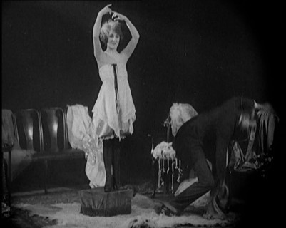 Alphonse Berge, Famous Fashion Designer,  Constructing a Dress, a Female Civilian Model..., 1920. Creator: British Pathe Ltd.