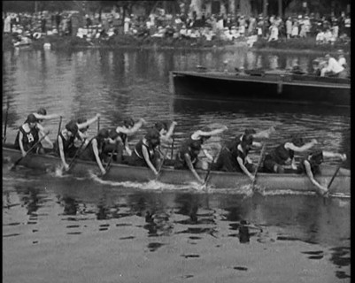 Young Female Civilians Wearing a Team Sport Outfit in a Rowing Race, an Audience Is Seen on..., 1920 Creator: British Pathe Ltd.