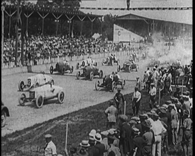Racing Cars at the Start of a Race in Front of a Large Crowd, 1920. Creator: British Pathe Ltd.