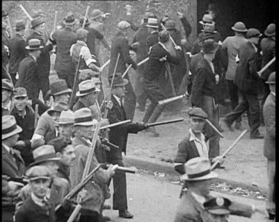 Small Crowd of American Civilians on a Demonstration/Strike in Conflict with the Police, 1930. Creator: British Pathe Ltd.