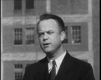 Male American Officer Giving an Official Statement Outside a Prison During the Investigation...,1930 Creator: British Pathe Ltd.