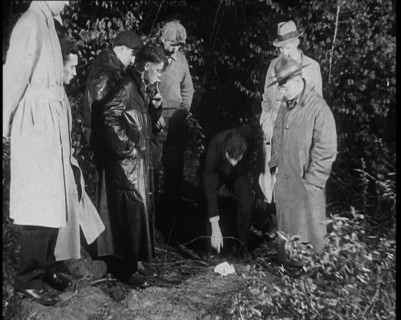 American Police Officers Searching the Area Outside American Aviator Charles Augustus..., 1930s. Creator: British Pathe Ltd.