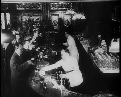 American Civilians Celebrating the End of Prohibition Drinking in a Bar, 1930s. Creator: British Pathe Ltd.