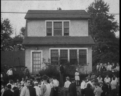 Small Crowd of American Civilians Gathering Outside Bruno Richard Hauptman's House in the..., 1930s. Creator: British Pathe Ltd.