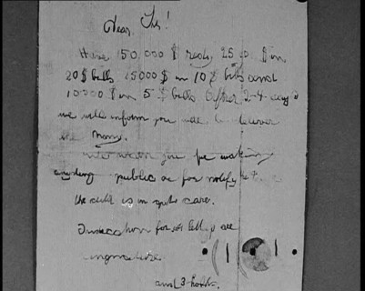 Notes of Ransom Being Shown as Articles of Evidence in the Lindbergh's Kidnapping Case Trial, 1930s. Creator: British Pathe Ltd.