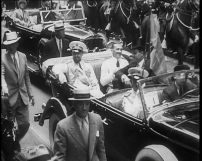 Italo Balbo Sitting in a Car With Others, 1933. Creator: British Pathe Ltd.