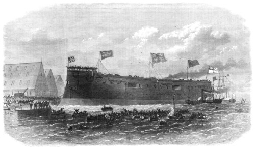 Our Iron-Clad Fleet: floating of Her Majesty's ship Hercules, at Chatham, 1868. Creator: Unknown.
