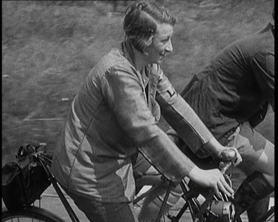 Large Group of Civilians Riding Bicycles Through Country Lanes, 1931. Creator: British Pathe Ltd.