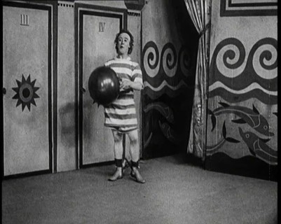 Stanley Lupino Performing in a Show in London Wearing a Stripy Bathing Suit, 1922. Creator: British Pathe Ltd.
