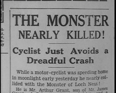 Newspaper with Headline Reading: 'The Monster Nearly Killed! - Cyclist Just Avoids a Dread..., 1933. Creator: British Pathe Ltd.