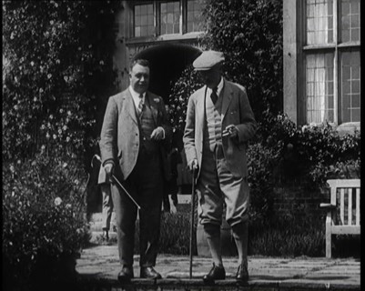 British Prime Minister Ramsay MacDonald Exits the Door of Chequers Holding a Stick..., 1924. Creator: British Pathe Ltd.