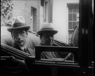 President of the Irish Republic Eamon De Valera Getting Into a Motorcar With a British Man..., 1921. Creator: British Pathe Ltd.