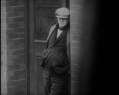 Male Civilians Standing in the Streets, 1926. Creator: British Pathe Ltd.