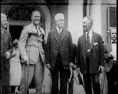 Franklin D. Roosevelt Stands on Crutches Besides Democrat Al Smith and Another Man, 1924. Creator: British Pathe Ltd.