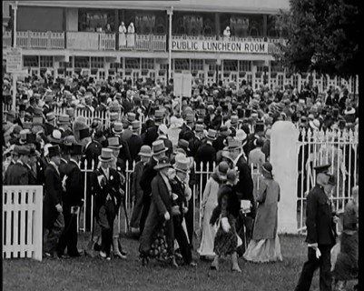 A Large Crowd of Smartly Dressed People in Hats at Ascot Horse Racing Track, 1931. Creator: British Pathe Ltd.