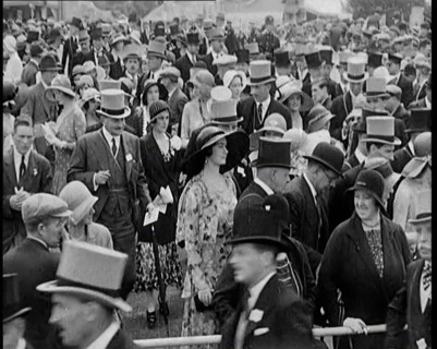 A Large Crowd of Smartly Dressed People in Hats at Ascot Horse Racing Track, 1931. Creator: British Pathe Ltd.