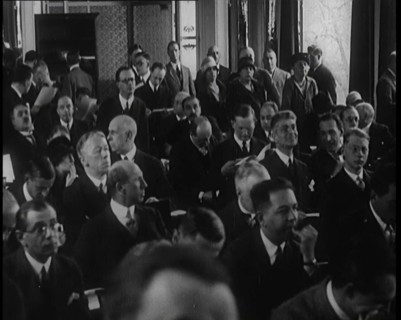 A Large Group of Male and Female Delegates from the League of Nations Sitting in a Room, 1924. Creator: British Pathe Ltd.