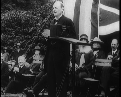 Winston Churchill Making a Speech from a Platform Infront of a Small Crowd, 1924. Creator: British Pathe Ltd.