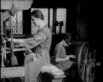 Female Civilian and Female Child Spinning and Weaving, 1931. Creator: British Pathe Ltd.