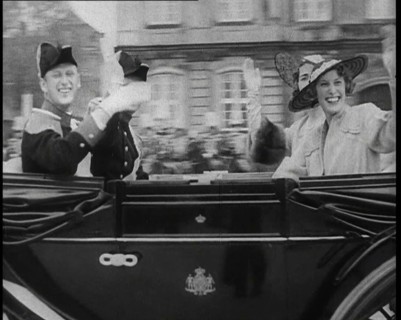 Well Dressed Men and Women Riding in a Car, 1930s. Creator: British Pathe Ltd.