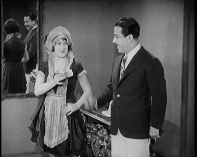 Scene from the Film 'The Compulsory Husband': The Actor Monty Banks Arriving at the House..., 1920s. Creator: British Pathe Ltd.
