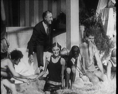 American Politician Franklin Delano Roosevelt Laughing as People Around Him Are Jumping..., 1921. Creator: British Pathe Ltd.