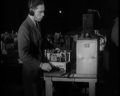 Male Civilian Building a Radio Wireless Set in a Factory, 1931. Creator: British Pathe Ltd.
