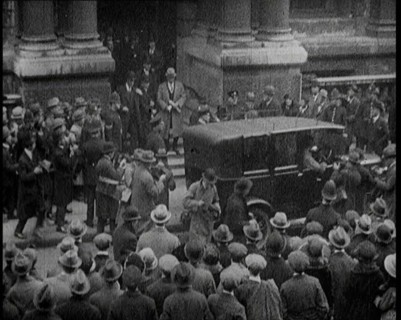 People Gathering and Coming and Going Outside the Carlton Club in London, 1922. Creator: British Pathe Ltd.