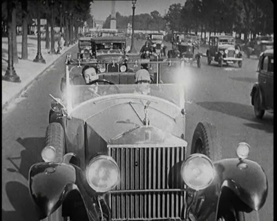Scene from the Film 'The Compulsory Husband': The Actor Monty Banks Driving a Car With..., 1920s. Creator: British Pathe Ltd.