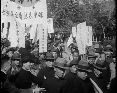 A Chinese Anti-War Protest With Male Attendees Both Military and Civilian Present Some..., 1938. Creator: British Pathe Ltd.
