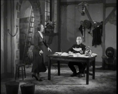 Comedian Robb Wilton On Set Playing a Fire Brigade Officer and Sitting at a Desk With Papers...,1938 Creator: British Pathe Ltd.