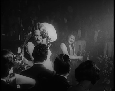 Female Civilian Singing in a Nightclub. She Walks Towards a Male Civilian and Dances in..., 1924. Creator: British Pathe Ltd.