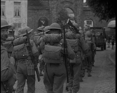British Soldiers Marching Through a French Town, 1940. Creator: British Pathe Ltd.