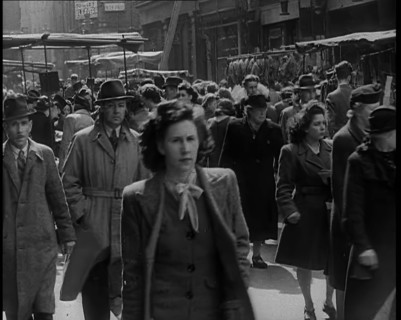 People Moving Along Crowded Streets, 1940. Creator: British Pathe Ltd.