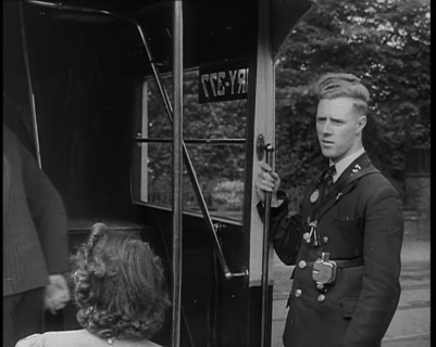 Bus conductor, 1940. Creator: British Pathe Ltd.