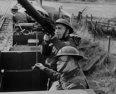 British Soldiers Manning a Machine Gun on an Improvised Armoured Miniature Train, 1940. Creator: British Pathe Ltd.