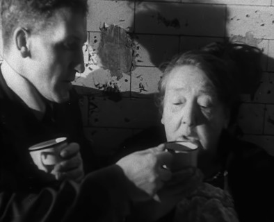 Civilians Drinking Hot Drinks While Sheltering from Bombs in the London Underground, 1940. Creator: British Pathe Ltd.