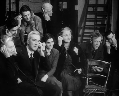 People Listening to Parents Calling Evacuee Children in America Over the Radio, 1940. Creator: British Pathe Ltd.